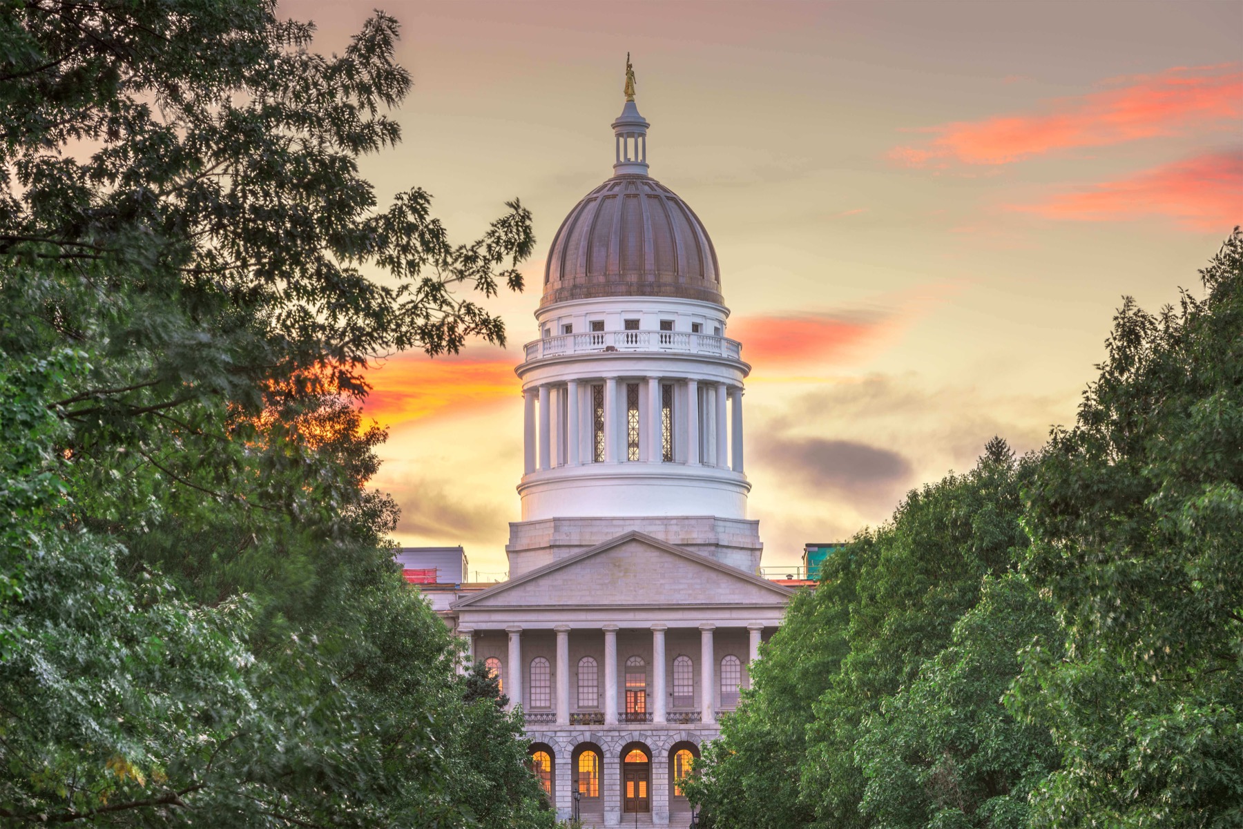Exterior of the Maine State capitol building at dusk
