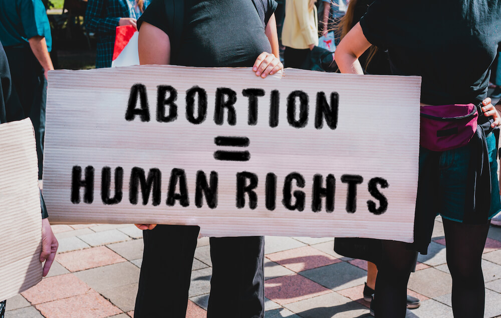 Protest sign reads, "Abortion = Human Rights"