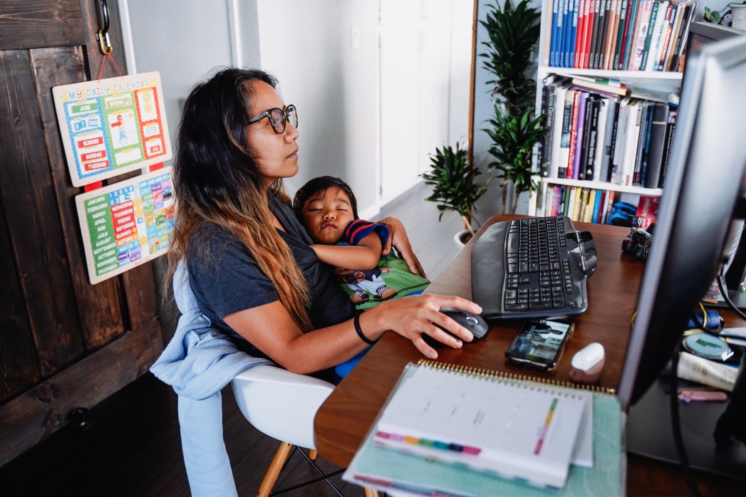 Asian mother and son working from home office